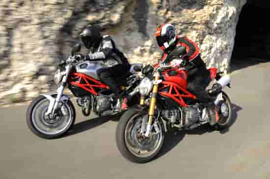 2009 Ducati Monster 1100 (silver) and Monster 1100S (red)