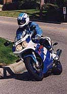 A Suzuki GSXR 1100 has great acceleration. You'll be at 100 mph in under 3 seconds. You can hit 150 without trying too hard. Just remember that the peace officer's radio can always call ahead faster than you can outrun him.